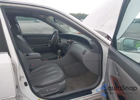 2003 Toyota Avalon Xls z USA, uszkodzony, nr VIN 4T1BF28B13U337603